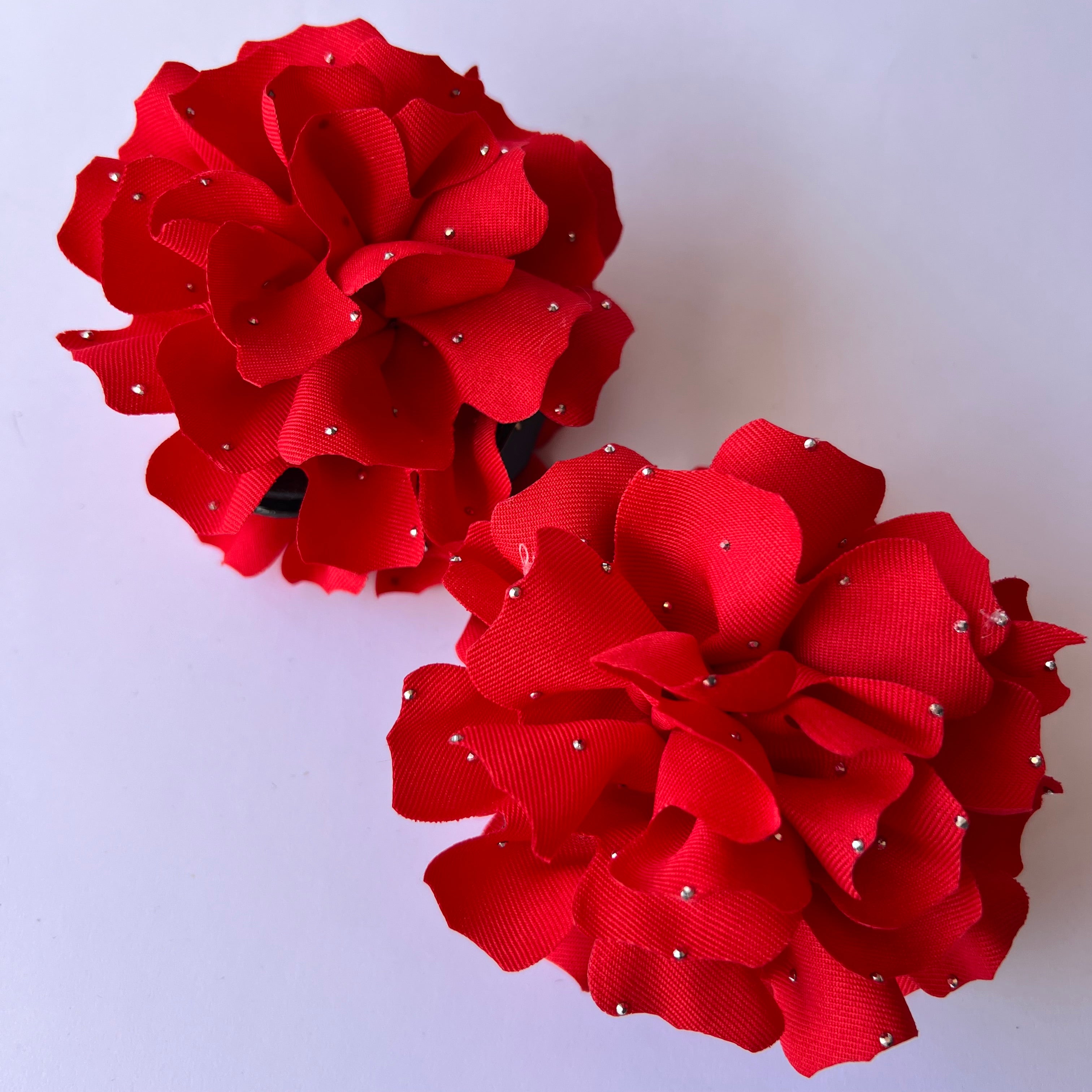 Flor roja brillitos